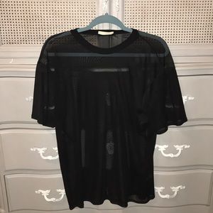 Black blouse, shirt. See through